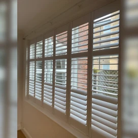Living room full height shutters