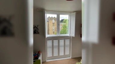 Tier on tier window shutters half open