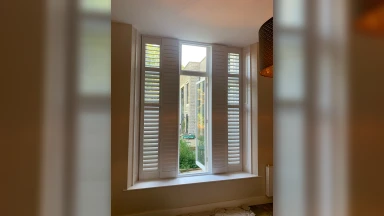 Open full height window shutter in Sheffield