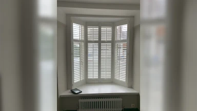 Small bay window shutters letting light through
