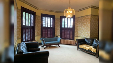Mahogany tier on tier window shutters fully closed