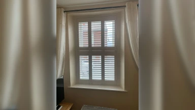 Full height tier on tier window shutters