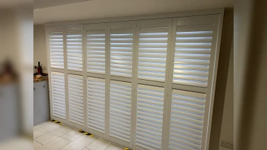 Closed tracked window shutters fitted in Sheffield