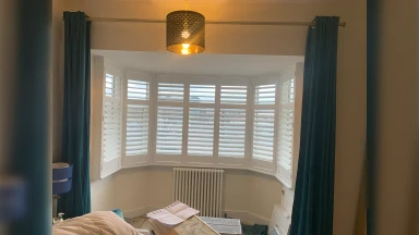 Fully open bay window shutters