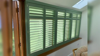 Green full height window shutter