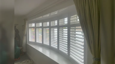 Large living room bay window fitted by Jason Shutter Specialist