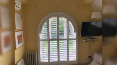 Arched window shutter