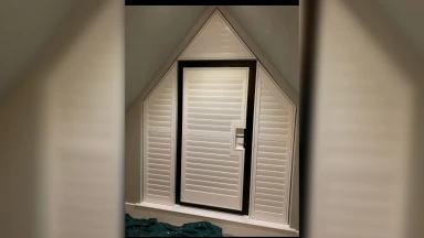 House shaped window shutter