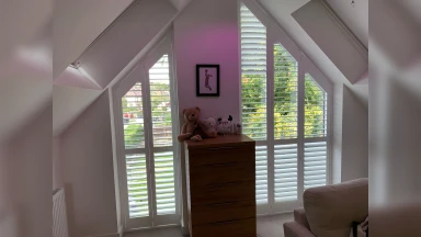Peak shaped window shutter with wall column split