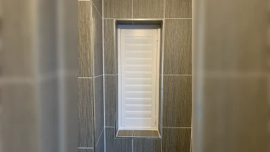 Closed small full height window shutter