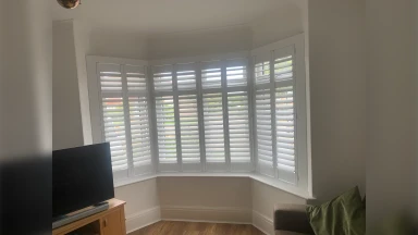 Half open bay window shutters in Sheffield